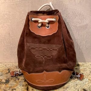 Brown suede back pack.